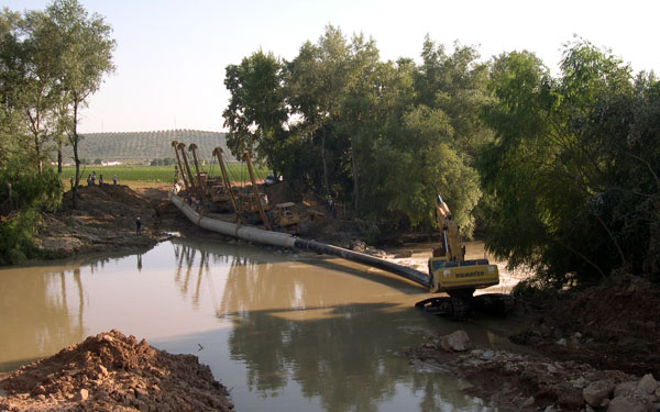 11 Cruce de Guadalquivir, Puesta en zanja